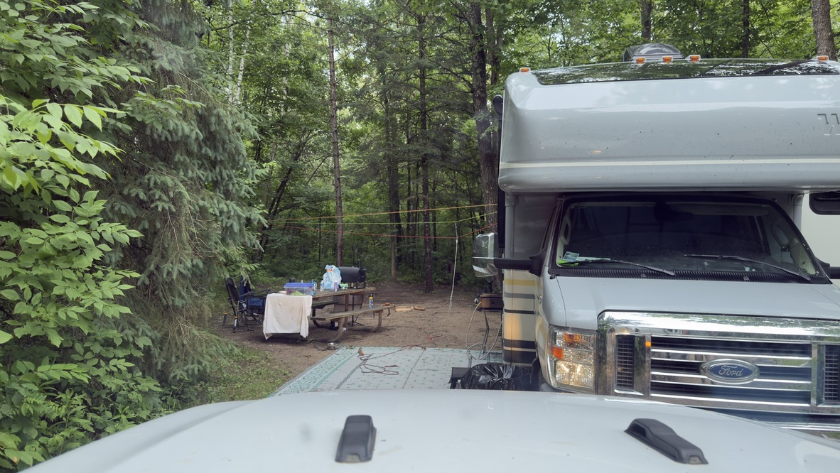 The Chuckwagon Express tucked into our wooded campsite